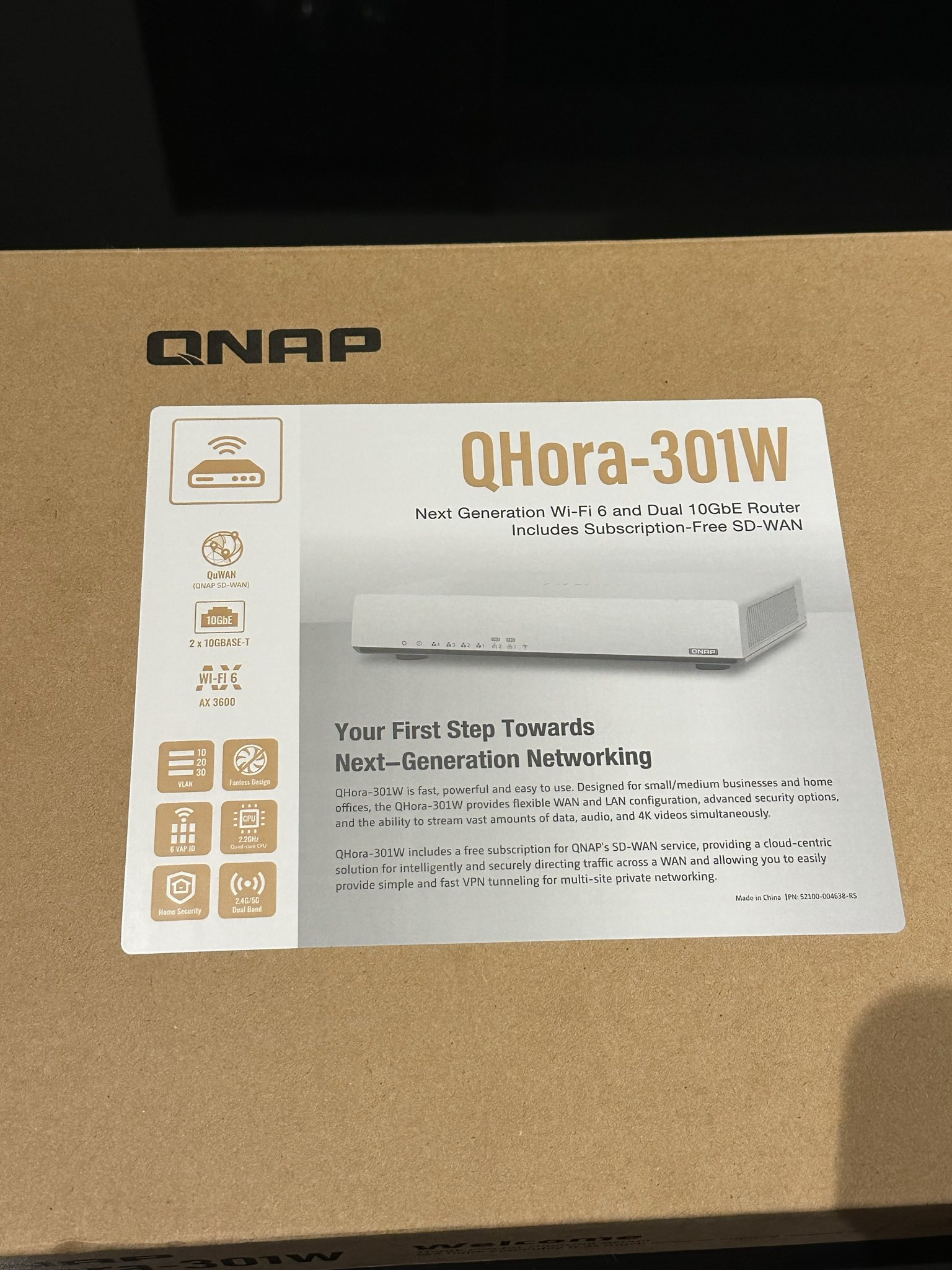 A boxed QNAP routerr